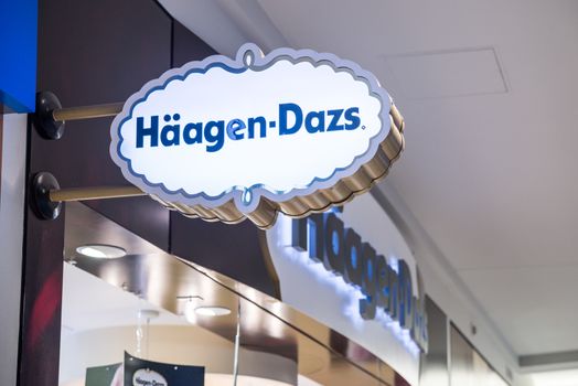 MINNEAPOLIS,MN - SEPTEMBER 26: Haagen Dazs store and logo in Mall of America, in Minneapolis, MN, on September 26, 2013. 