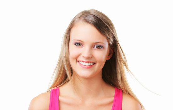 Positive, blonde girl smiling on a white background 