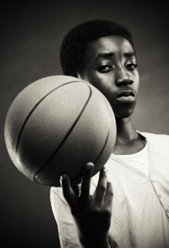 Portrait of african boy with basket ball