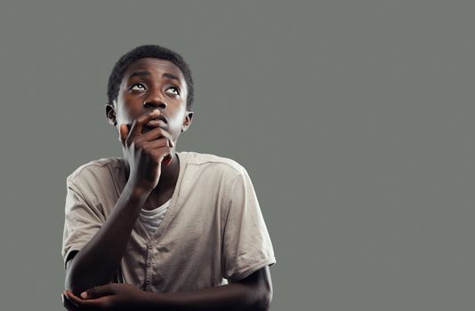 Portrait of an African boy looking up