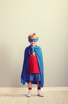 A young boy dreams of becoming a superhero.