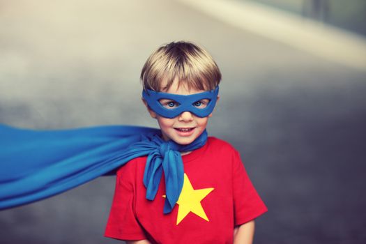 A young boy dreams of becoming a superhero.