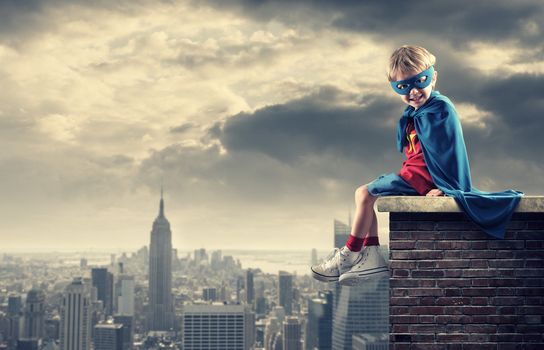 A young boy dreams of becoming a superhero.