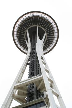 A view of the Space Needle in Seattle looking straight up at the observation deck