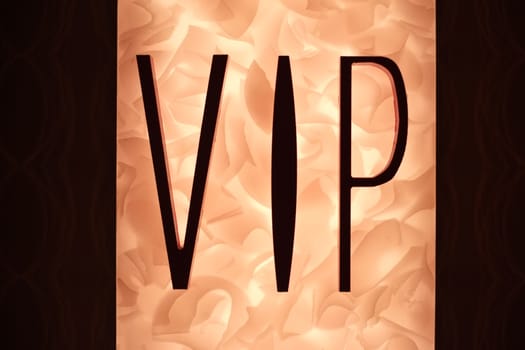 Very Important Person VIP sign with fiery background