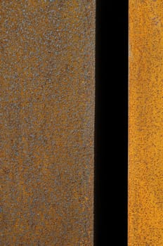 Orange Patterns on the Rusty Surface of Metal