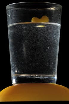 Healthy Food Italian Pasta Splashing in Water over a Black Background