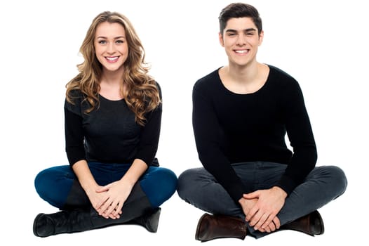 Attractive young loving couple, studio shot.
