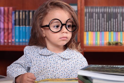 beautiful caucasian girl in the library