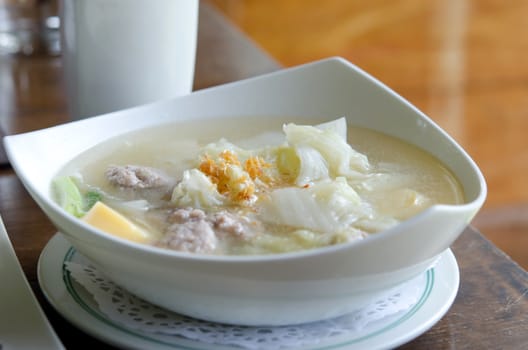 Homemade soup with , pork , meatballs ,   tofu and vegetable