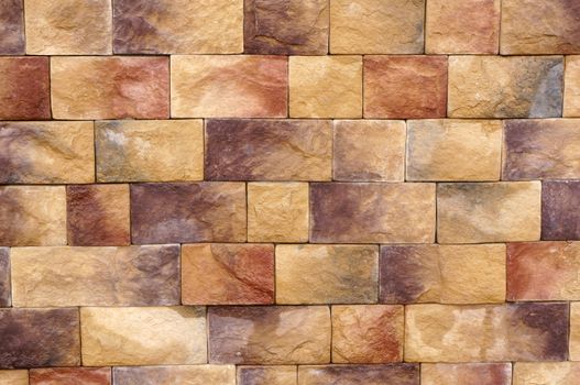 Wall texture of different colored stone blocks