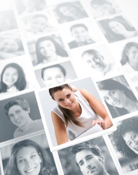 Conceptual portraits of a group of people with smiling woman using digital tablet