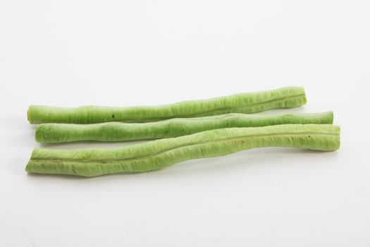 green beans on white background