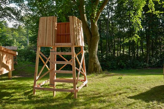 Hunter's box shooting stand in the forest - hunting image