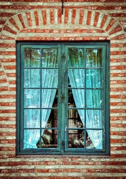 Old wooden window and with lace curtains