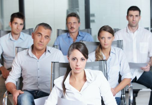 Portrait of a business team sitting together in the office 