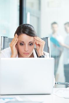 Young Businesswoman unhappy at work, she is think about her problems