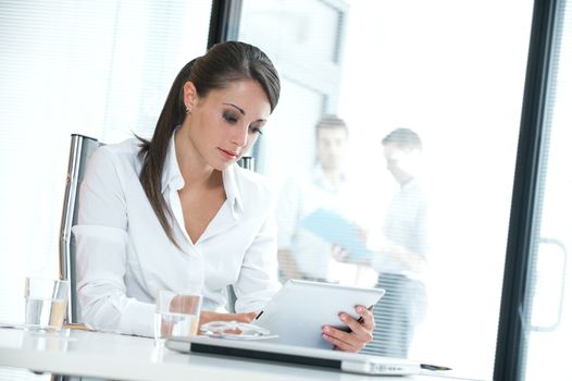 Portrait of a young executive woman in her office