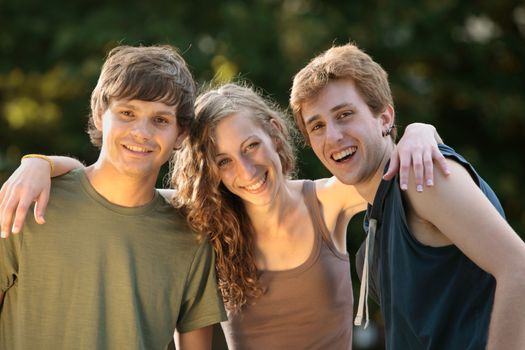 Young group of teenager friends smiling at camera