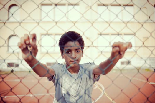 Portrait of young boy looking at camera