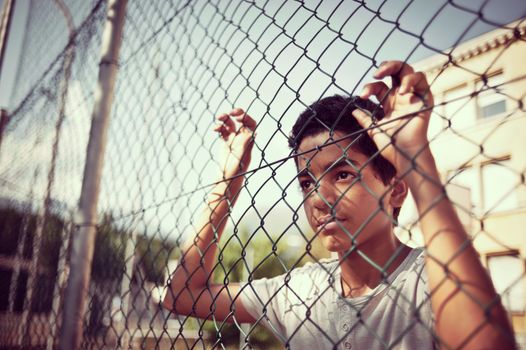 Portrait of young boy looking away