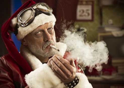 Portrait of a frowning Bad Santa smoking a joint