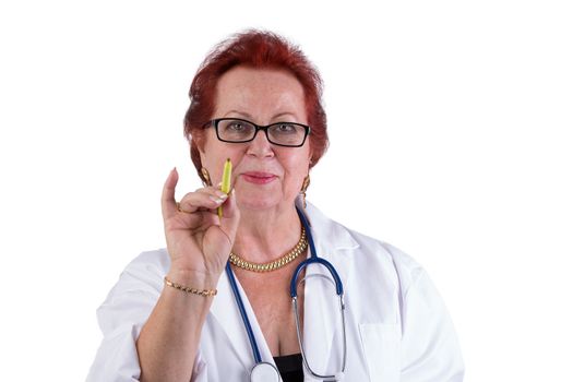 Senior Doctor making a point with her green pen , she has a genuine friendly look in her eyes, perhaps she expect you to get in to action with your health