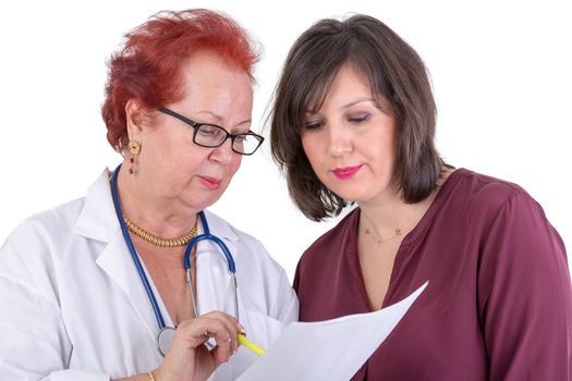 Female Doctor and her female patient discussing exam results, might be the payment options