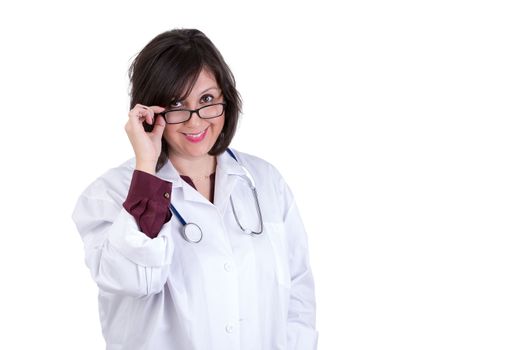 Sympathetic health care employee lady looking at you above her eye glasses, she has a happy trusting look