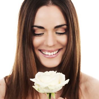 Portrait of cute woman with white rose 