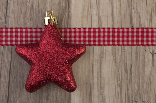 christmas decoration with christmas baubles red on wooden background 