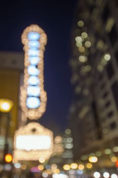 Old Historic Theater Marquee on Broadway Portland Oregon Downtown at Evening Blue Hour with Blurred Defocused Bokeh Blinking Lights