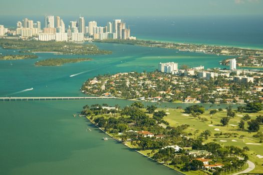 An aerial view of Miami region with islands and roads.
