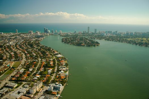 Aerial view of sprawling suburbs of Miami city waterfront, Florida, U.S.A.