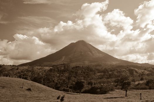 Sepia view of Arenal volcano on island of Costa Rica.