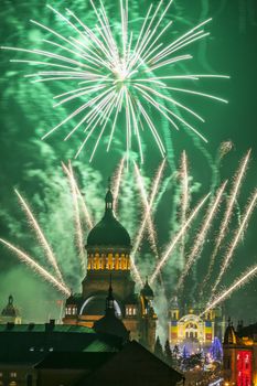 Beautiful fireworks show takes place in Avram Iancu Square in Cluj Napoca with the ocassion of The Romanian National day on 1 December 2013 in Cluj Napoca, Romania.