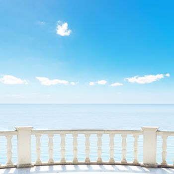 white balcony on terrace near sea and blue sky