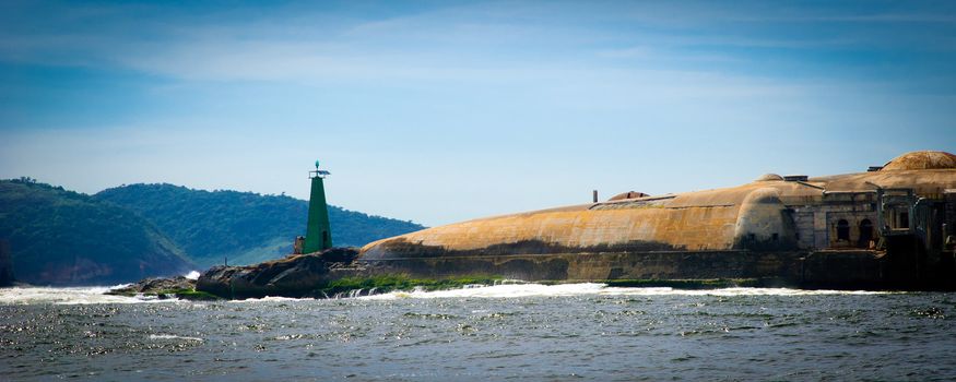 Lighthouse on coastline of Baia de Guanabara, Rio de Janeiro, Brazil.