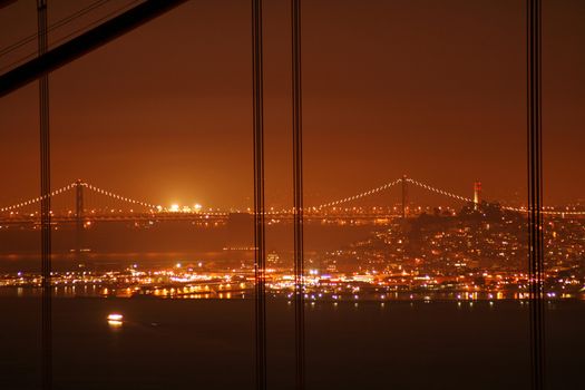 Bay Bridge and Golden Gate Bridge lit up at night, San Francisco Bay, San Francisco, California, USA