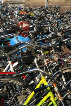 Bicycles parked at a sidewalk, Amsterdam, Netherlands