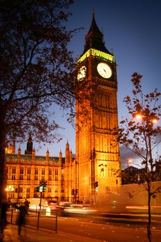 Clock tower of a government building lit up at night, Big Ben, Houses Of Parliament, City Of Westminster, London, England