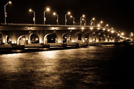 Bridge crossing from the Port of Miami to Downtown Miami, Florida, USA, at night.