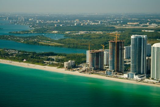 Aerial view of buildings in a city at the waterfront, Miami, Miami-Dade County, Florida, USA