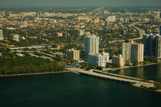 Aerial view of buildings in a city at the waterfront, Miami, Miami-Dade County, Florida, USA