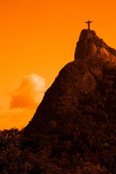 Scenic view of Christ the Redeemer statue and Corcovado mountain at sunset, Rio de Janeiro, Brazil.