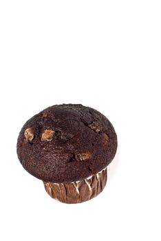 Close up of a fresh baked chocolate muffin against a white background