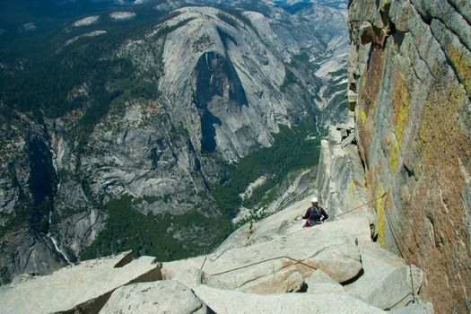 A climber on the Half Dome in the Yosemite National Park, California.