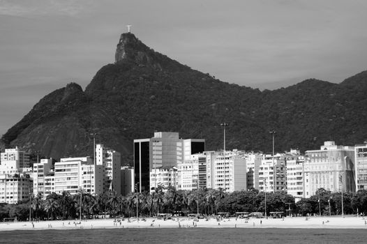 Cristo Redentor as seen from a boat in distant in the Baia de Guanabara in Rio de Janeiro, Brazil