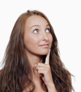 young girl looking up, thinking - isolated on white