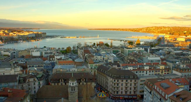 View on Geneva city and lake by sunset from Saint-Pierre cathedral, Switzerland